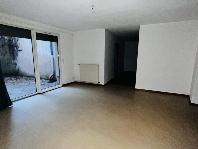 Appartement F4 + terrasse et double garage